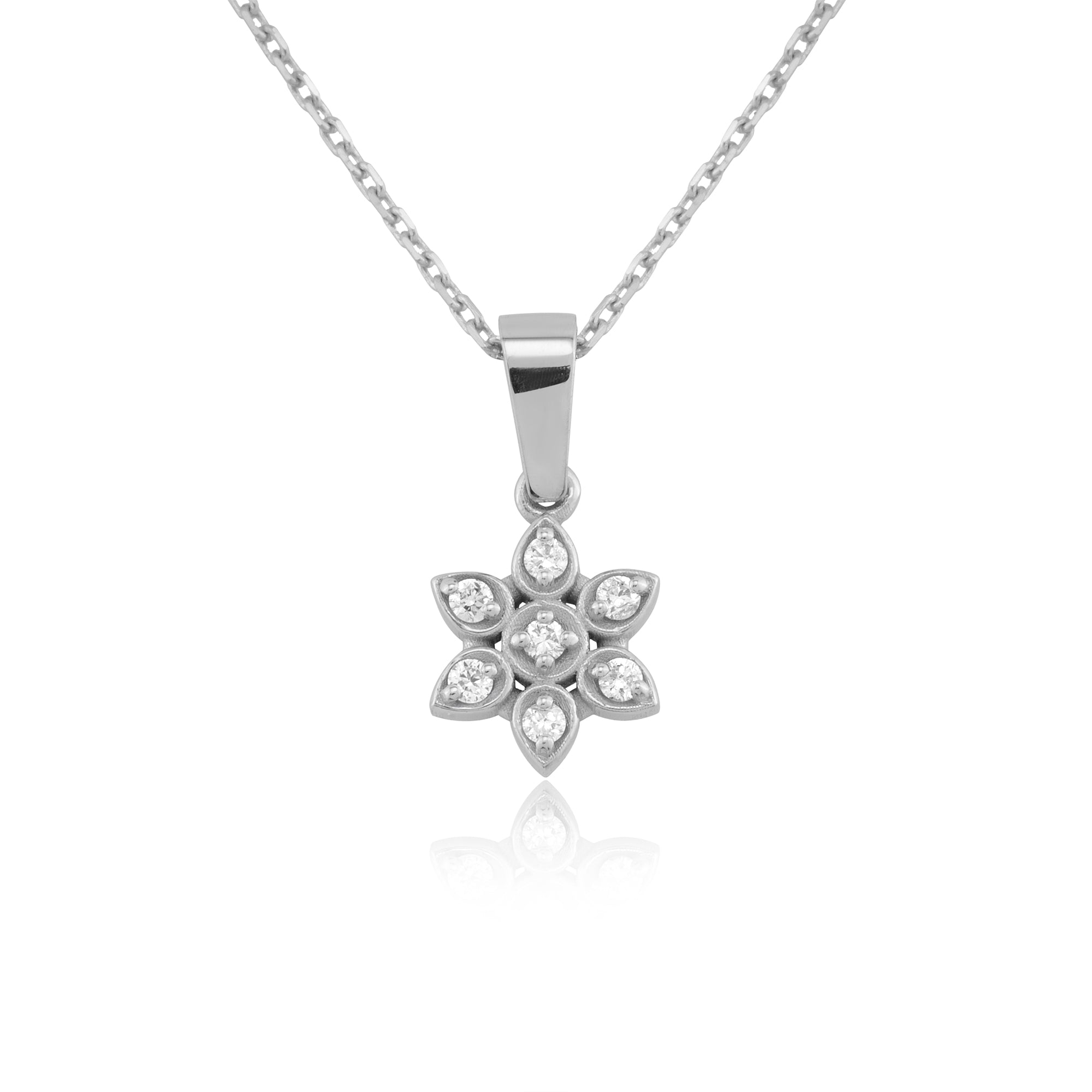 14K White Gold Diamond Flower Necklace with seven sparkling diamonds arranged in an elegant floral pattern. A timeless and dainty piece, perfect for gifting or everyday elegance.