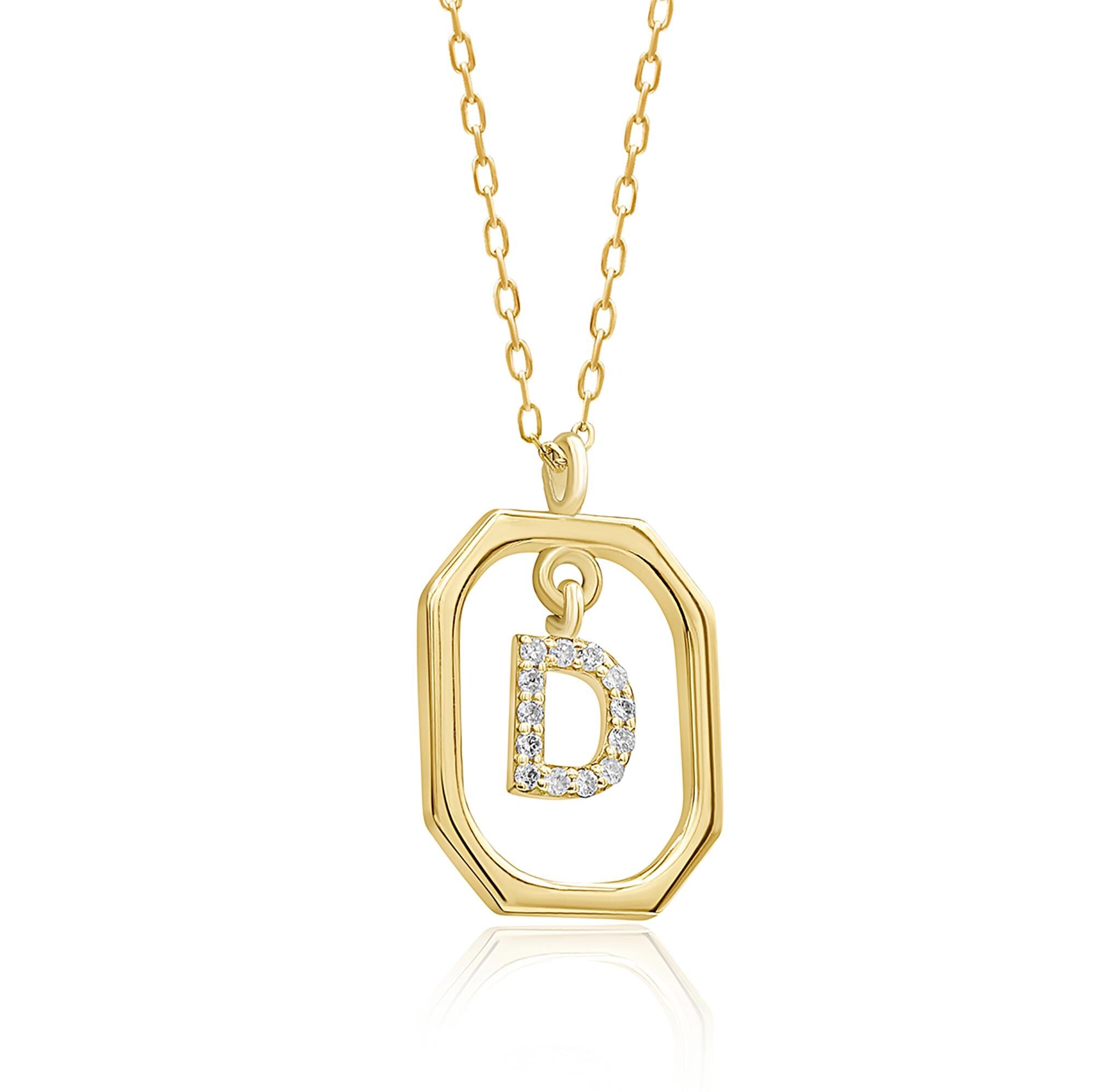 Here you can see the yellow gold version of this stunning initial necklace with a 6mm pendant in a 15mm geometric frame, adorned with real diamonds.