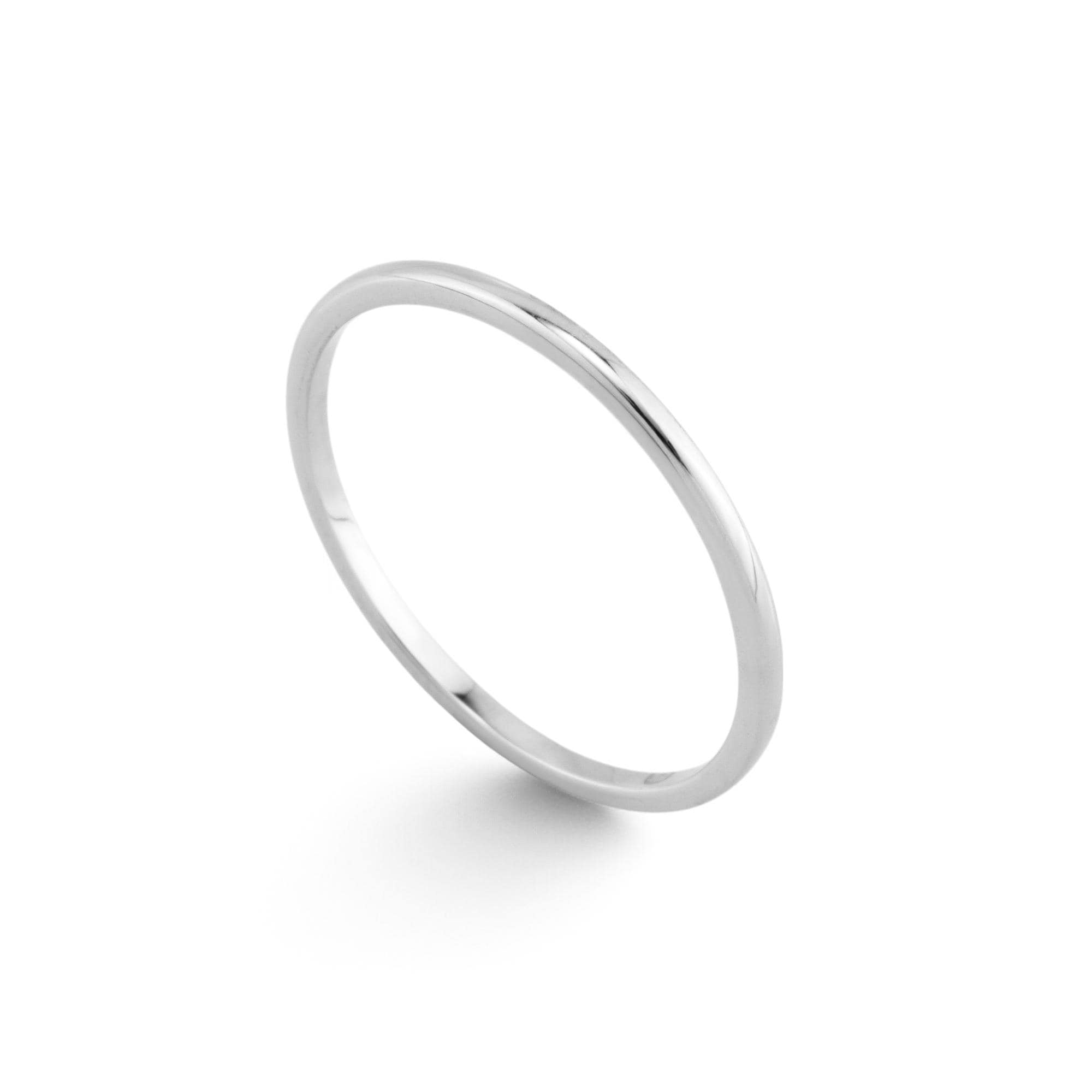 14K White Gold Wedding Band – A sleek wedding band crafted from solid 14K white gold, offering timeless elegance for everyday wear or special occasions.