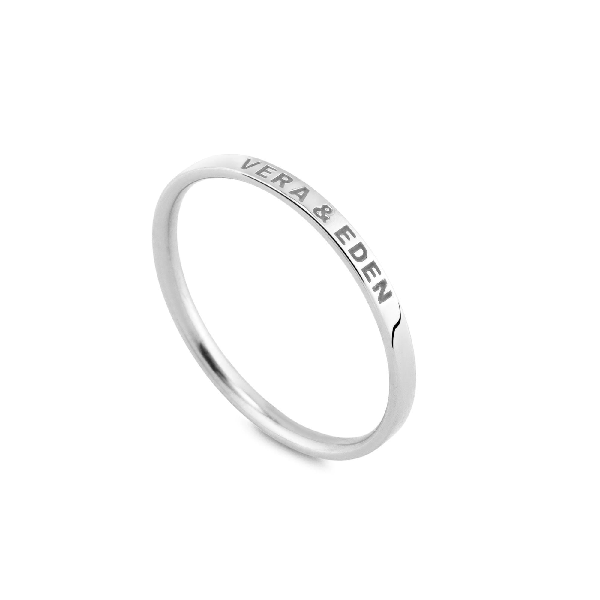 Stunning 14K white gold wedding band, personalized with inscriptions to reflect your unique love story. This beautiful ring is ideal for couples celebrating their commitment, handcrafted for lasting quality.
