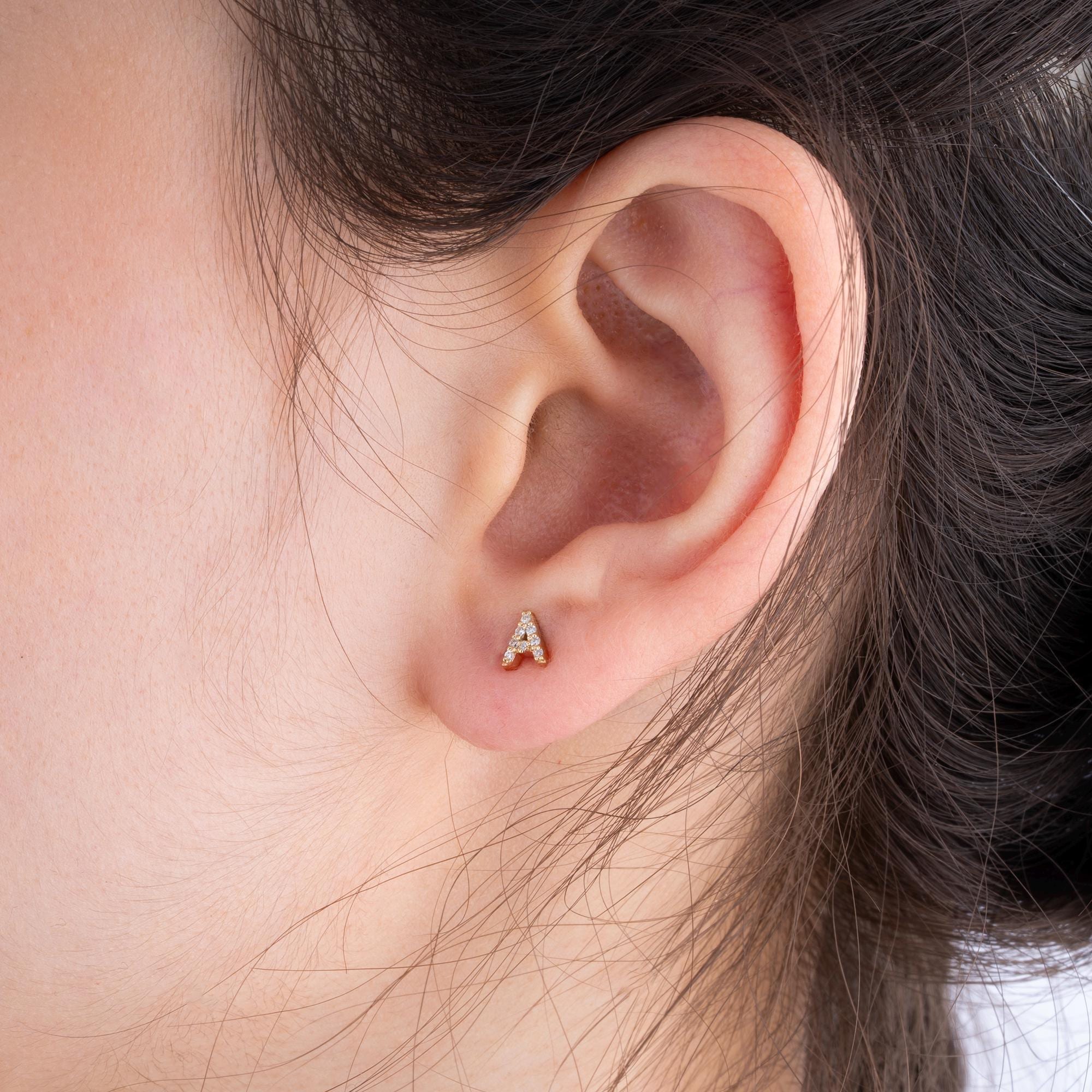 14K Gold Diamond Initial Stud Earrings with 30 round diamonds, offering a blend of elegance and sparkle, perfect for a personalized gift.