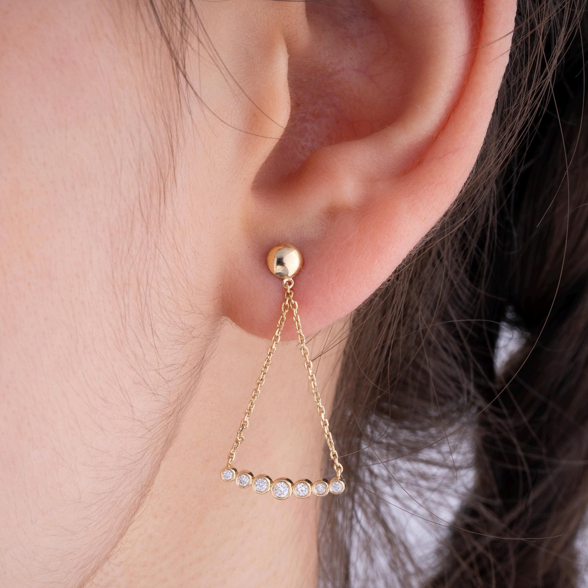 14K Gold Diamond Dangle Earrings with 14 natural diamonds, offering radiant sparkle and graceful movement, perfect for any occasion.