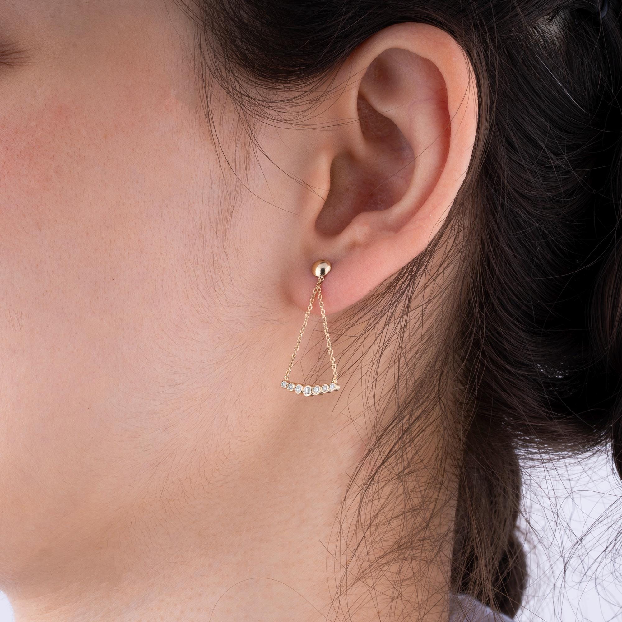 Elegant 14K Gold Diamond Dangle Earrings with 14 diamonds in F-G color and clarity, designed for everyday elegance and special moments.