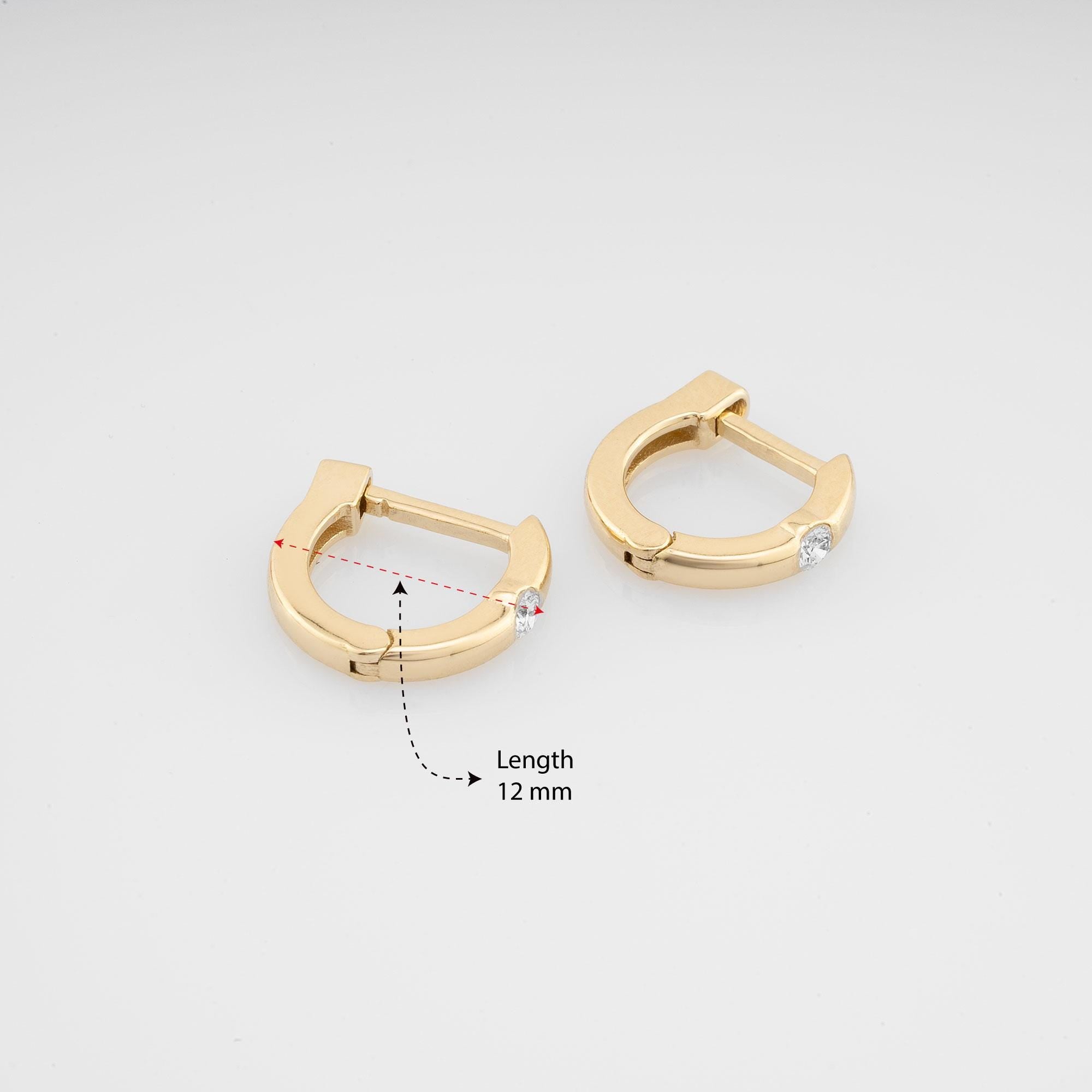 14K Gold Diamond Hoop Earrings – 12mm wide minimalist gold huggie hoops with natural diamonds, crafted for a refined and elegant look.