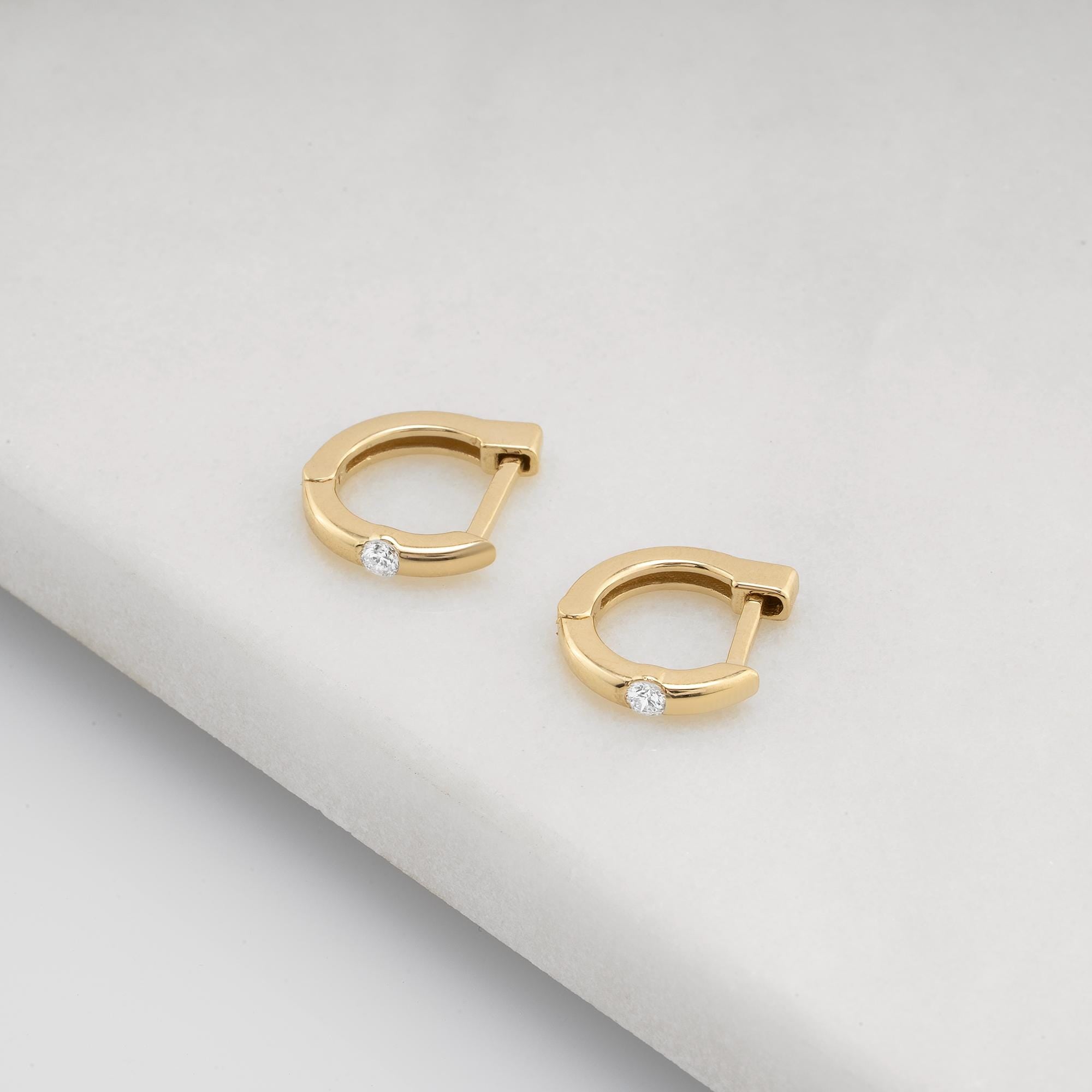 14K gold and diamond hoop earrings, a perfect jewelry gift for her, available in yellow, rose, and white gold.